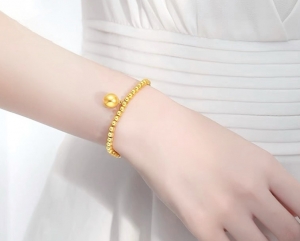 TTN2709 - Lắc tay titan bi trơn (màu vàng)