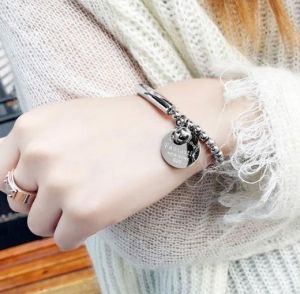 TT3437 - Lắc tay titan bi New York 520 (màu trắng)