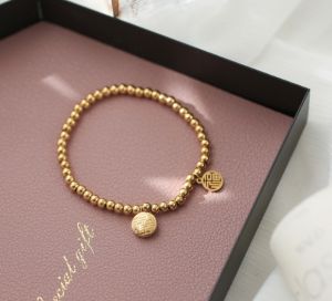 TTN3514 - Lắc tay titan bi chữ HỶ PHÚC (màu vàng)