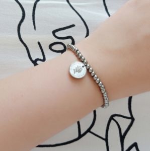 TT4659 - Lắc tay titan bi nữ hoàng (màu trắng)