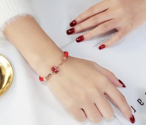 TT4665 - Lắc tay titan chỉ đỏ ống đá đỏ