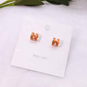 TT4765 - Bông tai titan Hermes nền cam