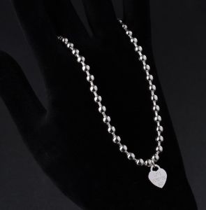 TTC4768 - Lắc chân titan tim LOVE FOREVER (màu trắng)