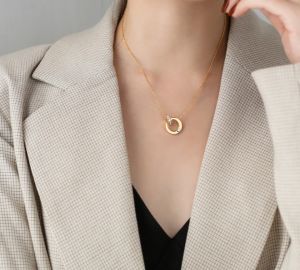 TT4776 - Dây chuyền titan vòng tròn 1 hạt đá zircon (màu trắng/vàng)