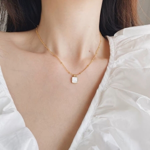 TTN4880 - Dây chuyền titan phối bi mặt xà cừ (màu vàng)