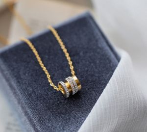 TTN5049 - Dây chuyền titan charm ống 3 hàng đá (màu vàng)
