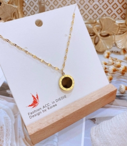 TTN5112 - Dây chuyền titan la mã 10mm 2 mặt đen trắng dây trúc (màu vàng )