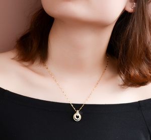 TT5224 - Dây chuyền titan dây trúc mặt tròn viền đá (màu vàng)