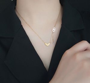 TT4297 - Dây chuyền titan tim nhỏ đá rơi (màu vàng)