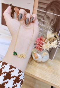 TTN5535 - Dây chuyền titan lông vũ đá xanh giọt nước (màu vàng)