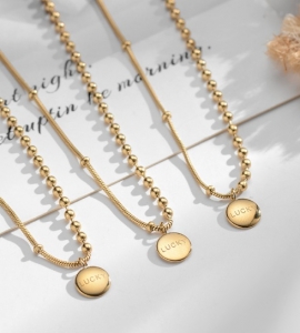 TTN5542 - Dây chuyền titan dây mì phối bi mặt tròn LUCKY (màu vàng)