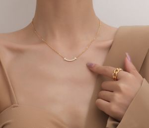 TTN5578 - Dây chuyền titan Tiffany&Co mini full xoàn (màu vàng)