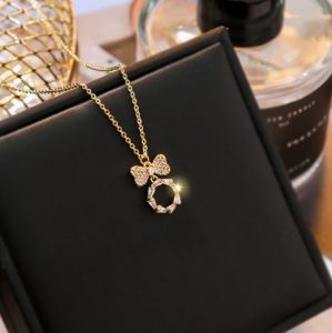 PK4721 - Dây chuyền cao cấp nơ vòng tròn viền đá