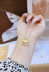 TTN5683 - Dây chuyền titan khóa trường thọ chạm khía 3 bi (màu vàng)