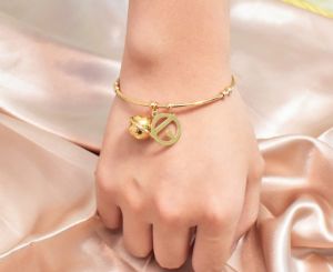 TT5713 - Vòng tay titan cuff chuông Doraemon (màu vàng/vàng hồng)