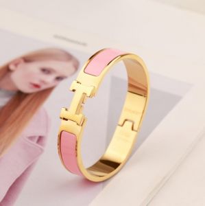 TT5730 - Vòng tay titan Hermes hồng bản to (màu vàng)