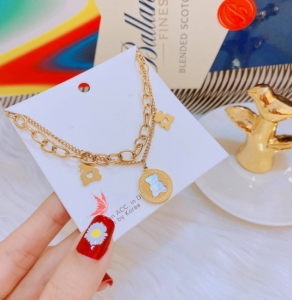 TT6328 - Lắc tay titan dây đôi gấu tim (trắng/vàng/vàng hồng)