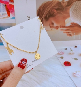 TT6539 - Lắc chân titan bi thỏ mặt cười (màu vàng)