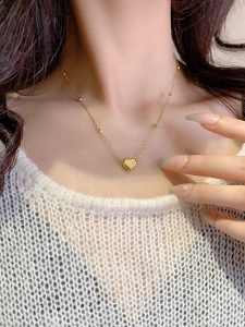 TTC6709 - Dây chuyền titan phối bi mặt tim (màu vàng)
