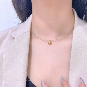 TTN6879 - Kiềng mảnh titan mặt bi tròn (màu vàng)