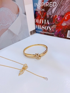 TT7234 - Set titan nơ viền đá (dây chuyền, vòng tay - màu vàng)