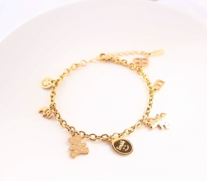 TTN7249 - Lắc tay titan xích mix nhiều chi tiết cute (màu vàng)