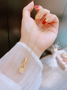 TTN7283 - Dây chuyền titan giọt nước kẹp đá (màu vàng)