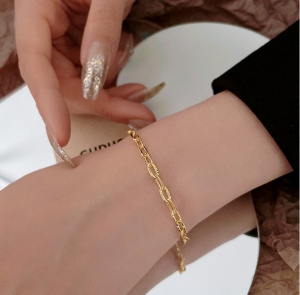 TTN7370 - Lắc tay titan xích chạm (màu vàng)