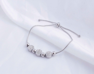 TTN7426 - Lắc titan dây rút 3 charm đá (màu trắng)