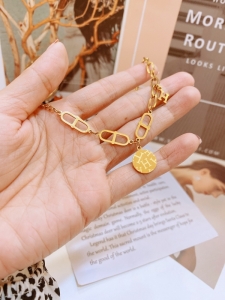 TTN7635 - Lắc tay titan Hermes (màu vàng)