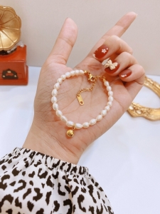 TTN7636 - Lắc tay titan trai nước ngọt bi tròn (màu vàng)