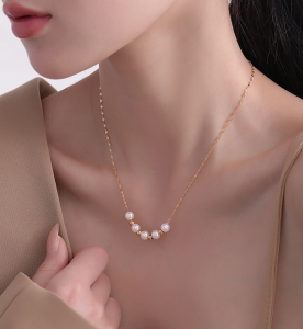 TTN7686 - Dây chuyền titan dây trúc bi mix hạt trai (màu vàng)