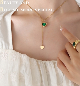 TTN7712 - Dây chuyền titan xích phối bi tim xanh (màu vàng)