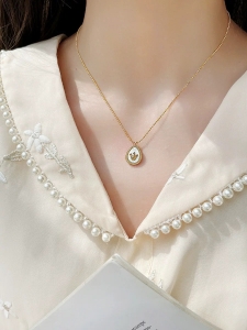 TTN7729 - Dây chuyền titan bi giọt nước vươn miện (màu vàng)