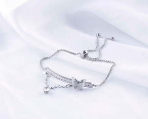 TTN7780 - Lắc tay titan dây rút bướm phun cát (màu trắng)