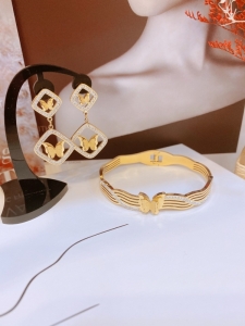 TT7911 - Set titan bướm phun cát (bông tai, vòng tay - màu vàng)