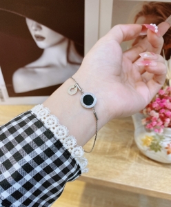 TTN7954 - Lắc tay titan mảnh dây rút mặt BVL (2 mặt đen & trắng)