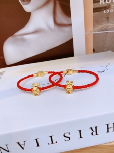 TTN8013 - Lắc tay titan dây đỏ thỏ xinh khóa bấm (màu vàng)