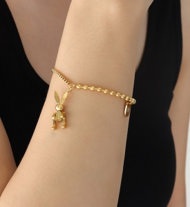 TTN8156 - Lắc tay titan phối bi dây rút thỏ LUCK (màu vàng)