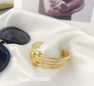TTC8350 - Vòng tay titan cuff bi 4 tầng (màu vàng)