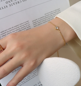 TTN8368 - Lắc tay titan 1 hạt đá (màu vàng)