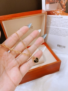 TTN8484 - Dây chuyền titan mặt ổ khóa tim đen chữ H (màu vàng)