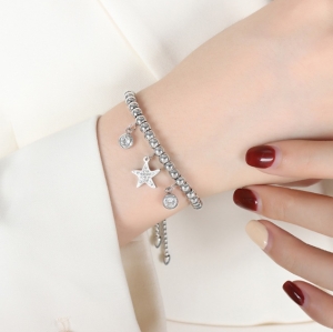 TTN8665 - Lắc tay titan bi dây rút phối charm (màu trắng)