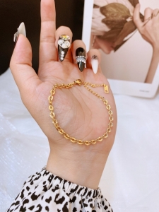 TTN8701 - Lắc tay titan xích chạm (màu vàng)