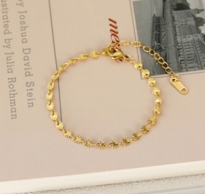 TTC8865 - Lắc tay titan mắc tròn nối chạm khía (màu vàng)