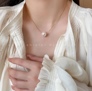 TTC8870 - Dây chuyền titan mắc nối liền xỏ hạt trai (màu vàng)