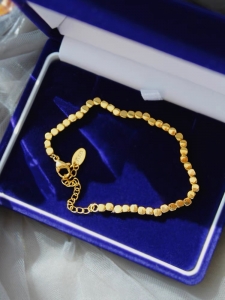 TTN8233 - Lắc tay titan hạt vuông (màu vàng)
