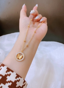 TTC10029 - Dây chuyền titan phối bi mặt bướm phun cát (màu vàng)