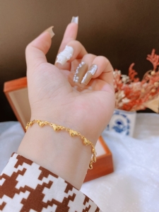 TTC10053 - Lắc tay titan tim nhí (màu vàng)