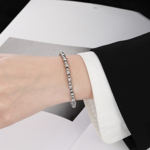 TTN10262 - Lắc tay titan bi chạm (màu trắng)